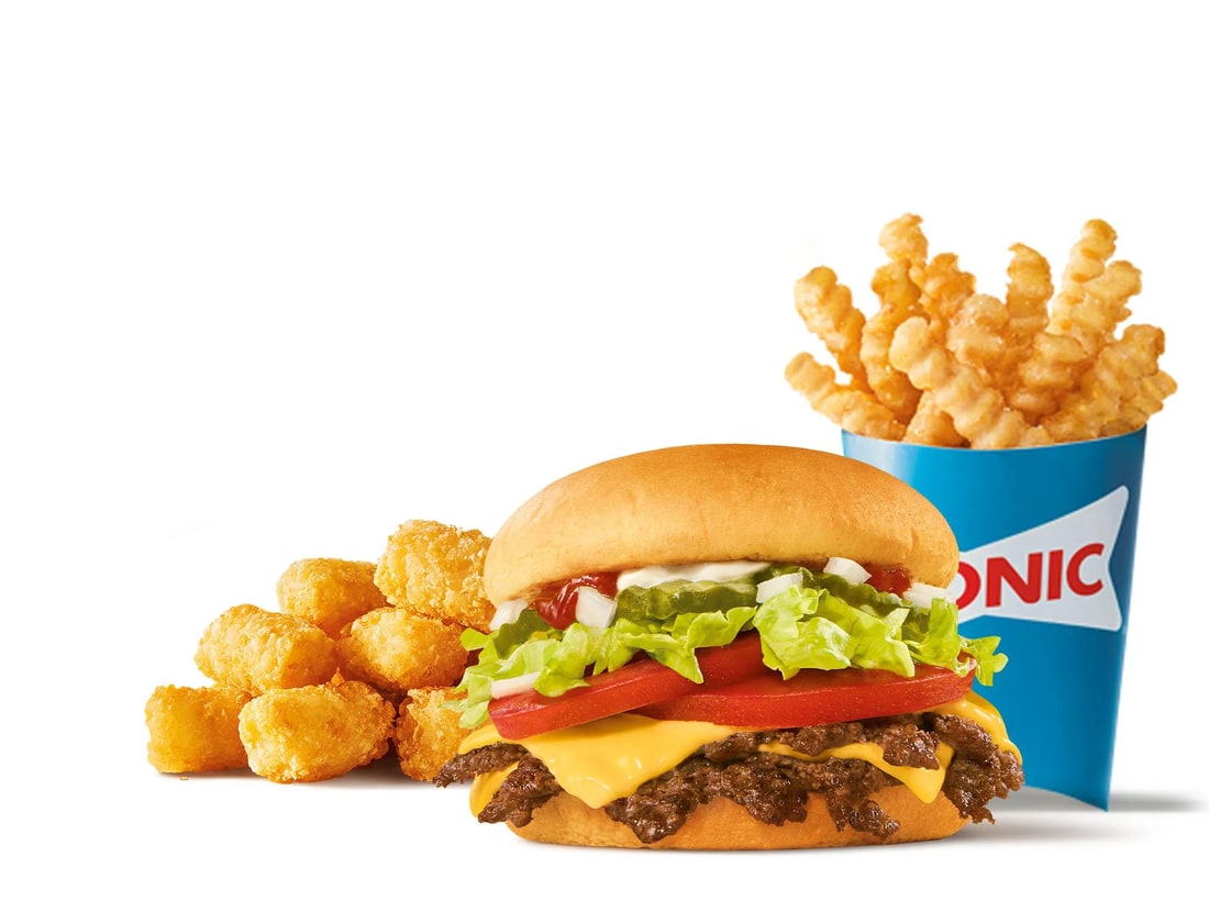 A SONIC cheeseburger with tater tots and crinkle-cut fries